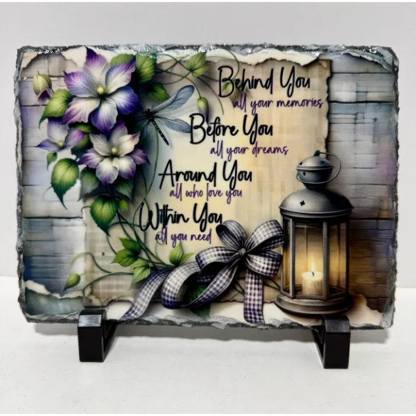 Clematis flowers and a dragonfly painted on natural-edge slate